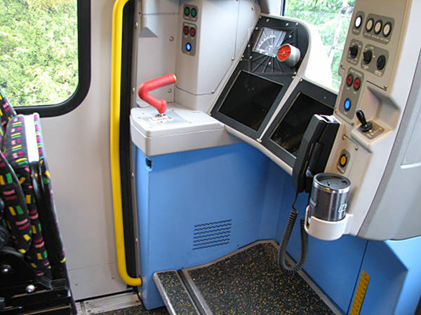 [PHOTO: Train cab interior: 55kB]
